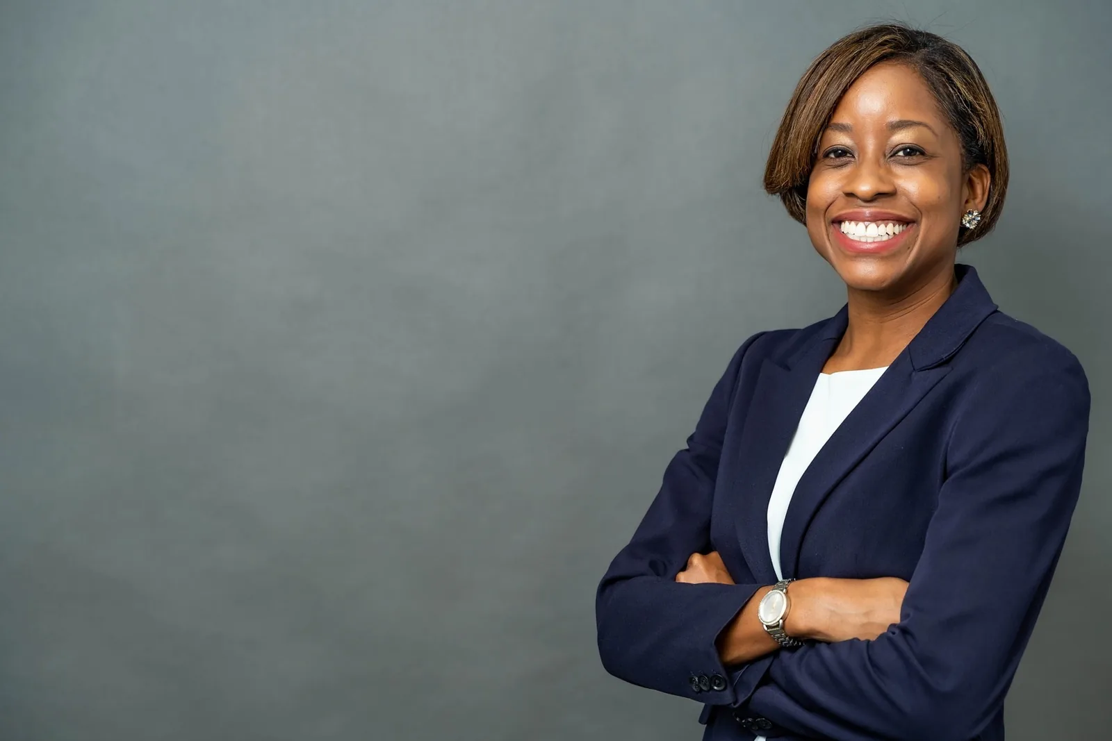 Smiling professional woman in a navy blazer